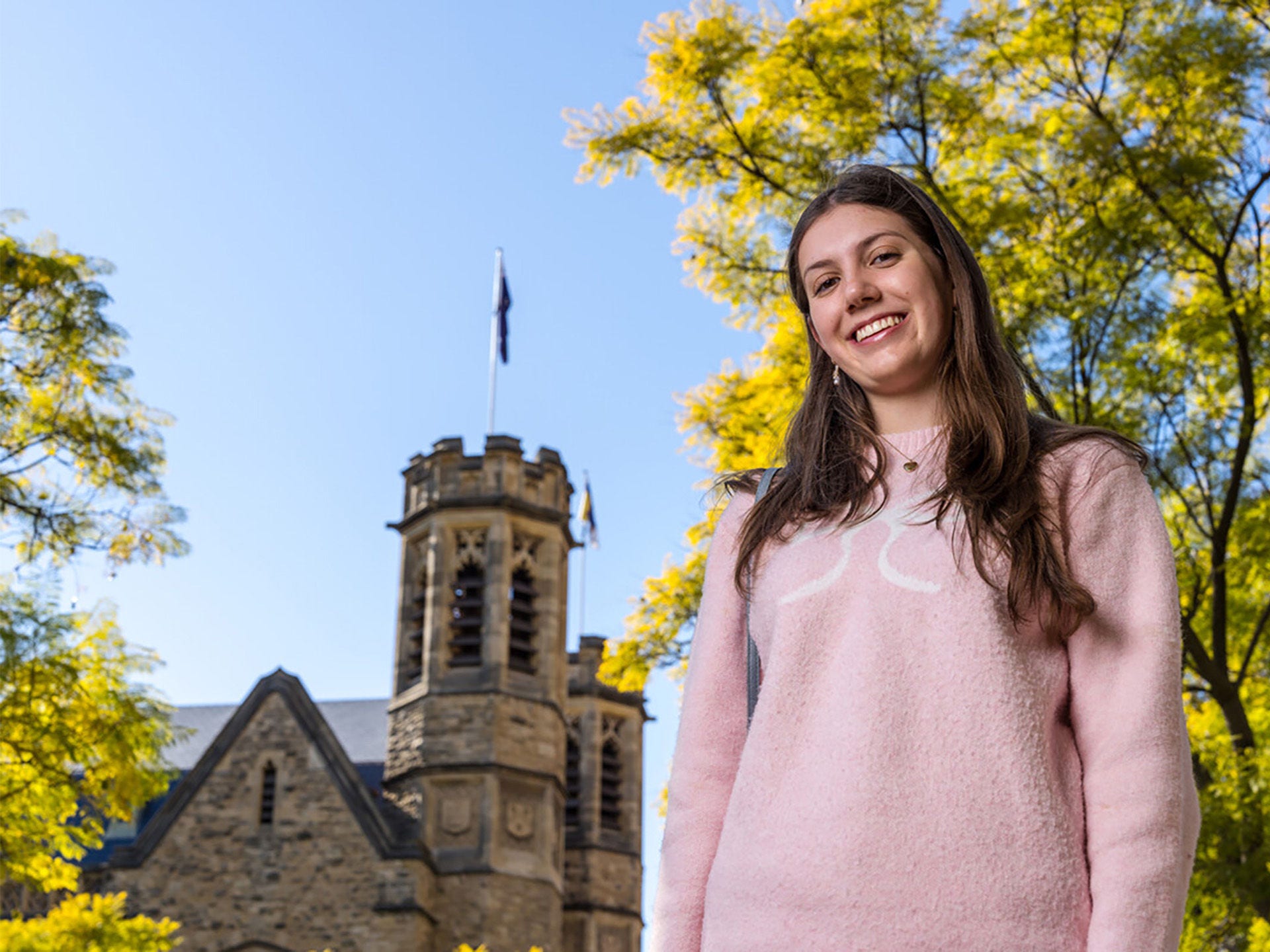 Student standing outside campus