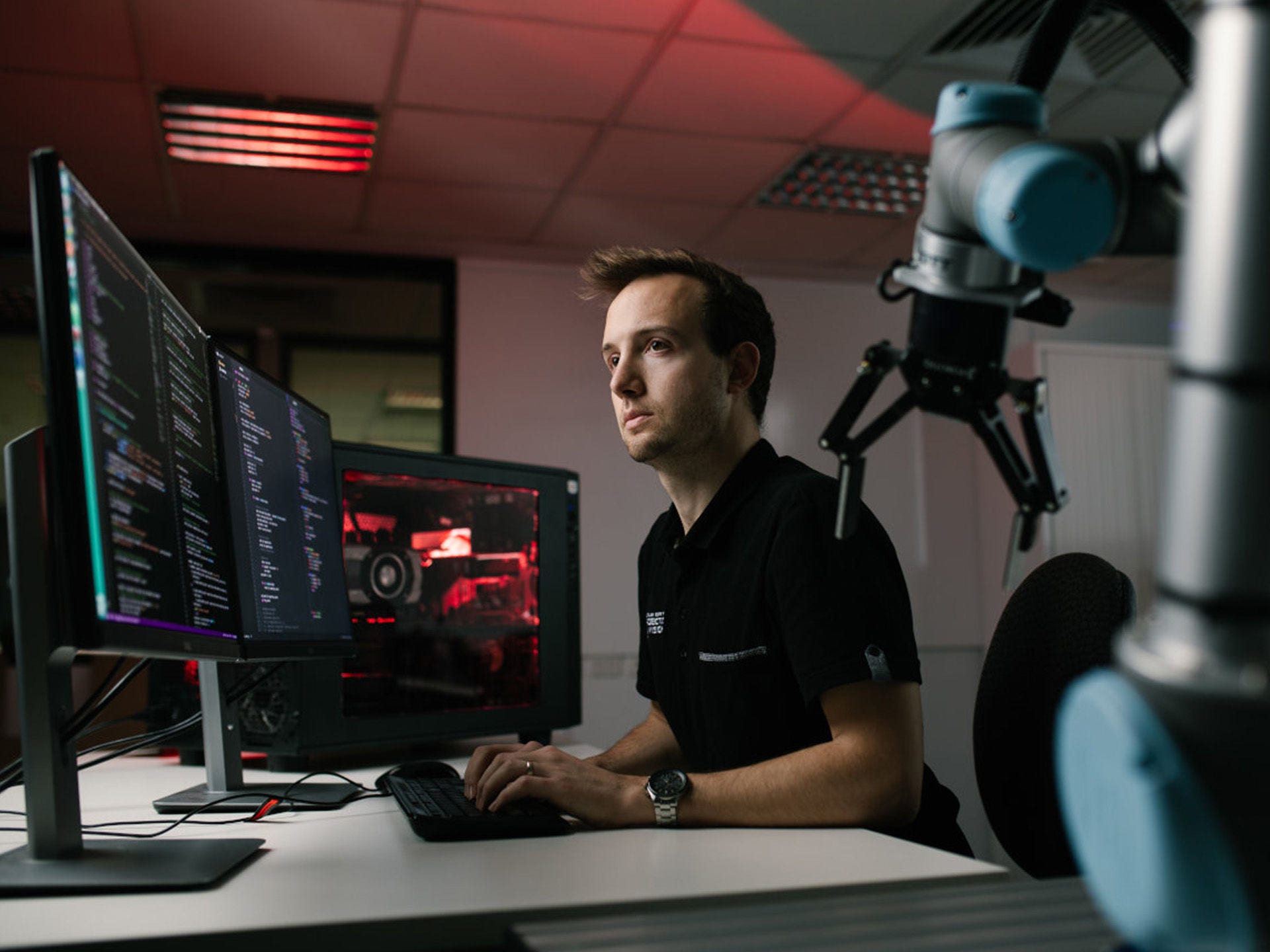 Staff member in a robotics lab