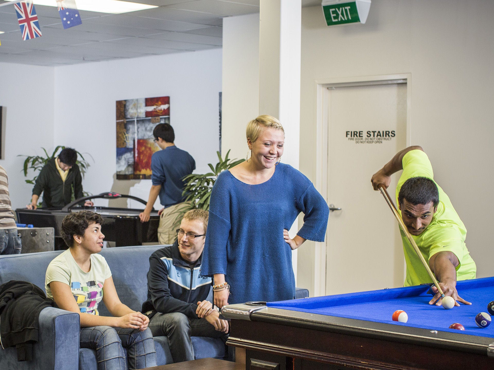 Residents socialising in the shared spaces at Adelaide University Village student accommodation