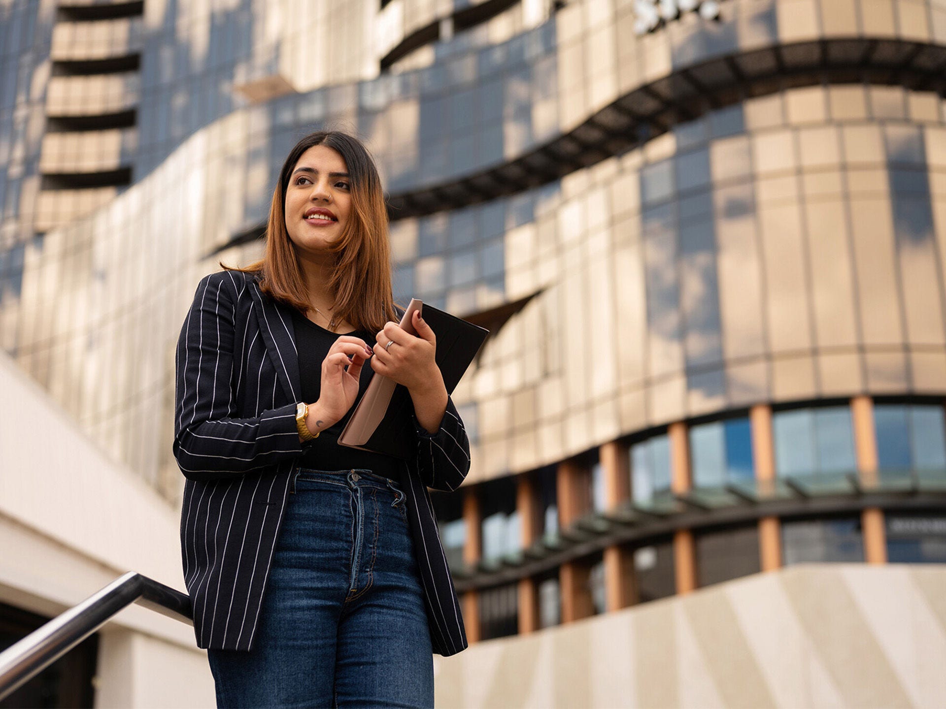 Student outside of building