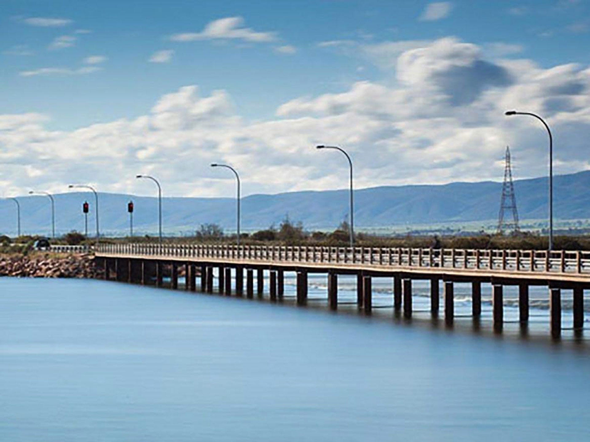 Port Pirie bridge over water with the hills in the background