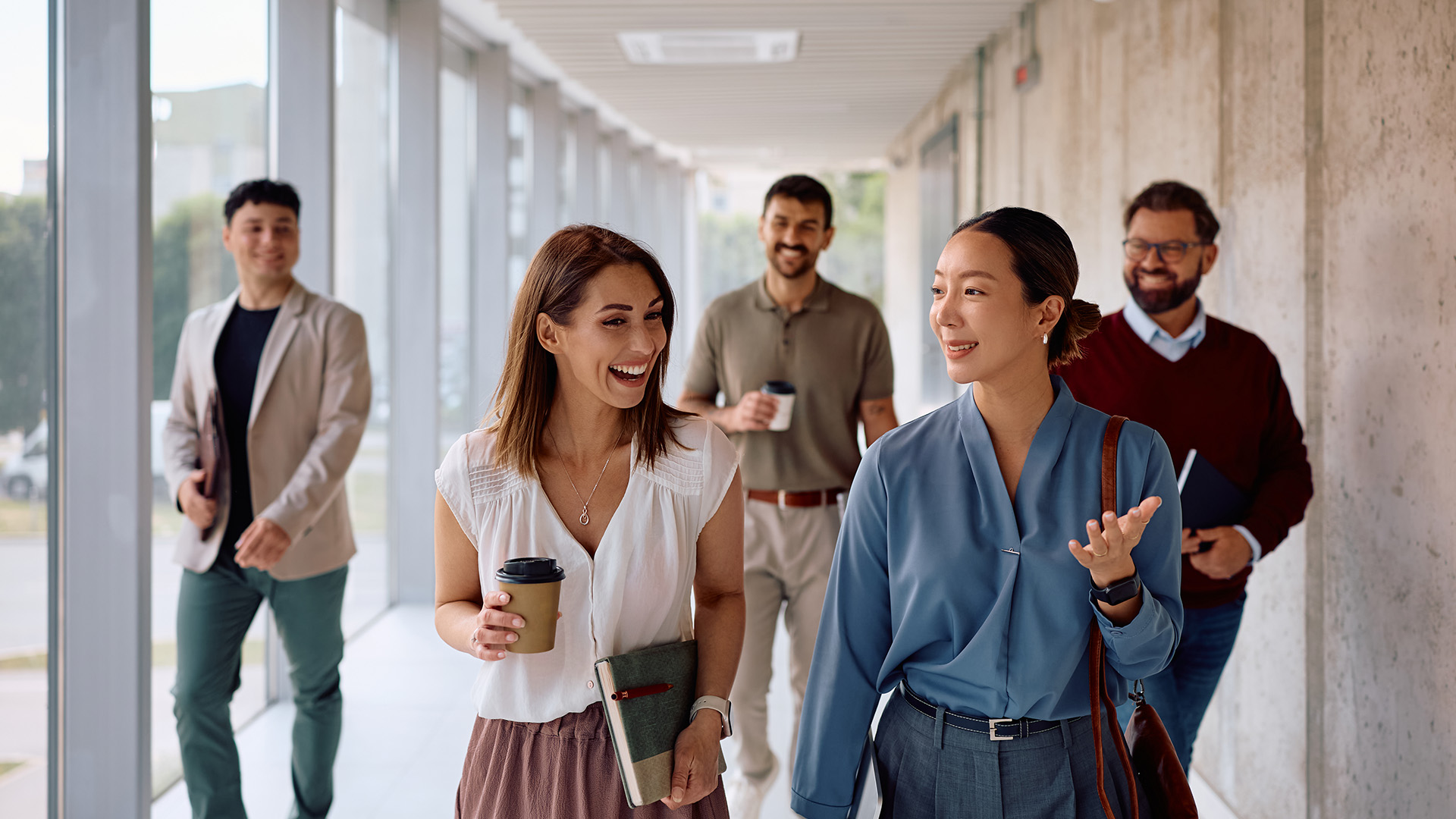 People chatting and walking image