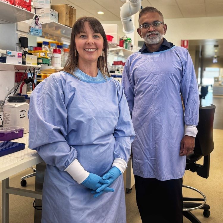 a female and male scientist in a lab