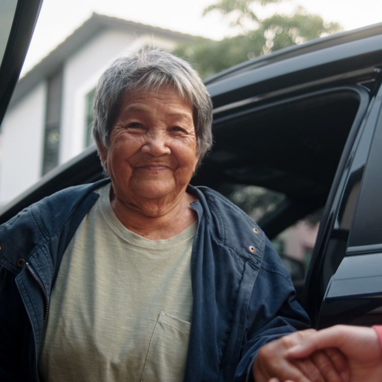 Woman exiting a vehicle