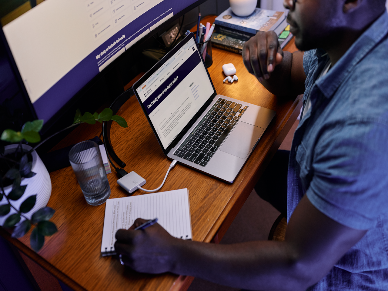 student assist officer smiling